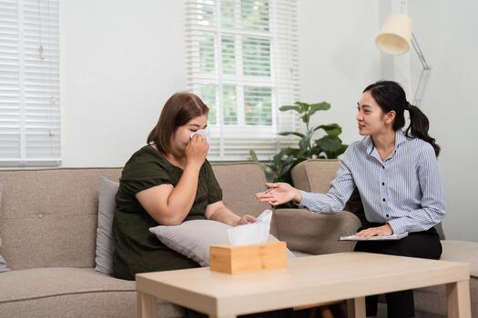 Understanding and Empathy. A psychiatrist has an open conversation with a patient confronting difficult emotions, providing understanding and empathy. photo