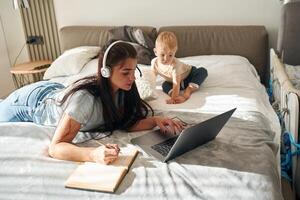 Mothe,r with her little son is at home in domestic room photo