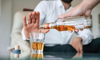 Man is rejected alcohol. No more drinking.. photo