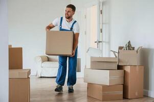Room full of boxes... Moving service employee photo