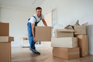 Room full ,of boxes. Moving service employee photo