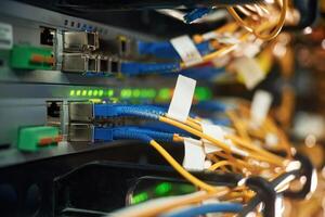 Blue and yellow wires. Close up view of ,hardware in the server room photo
