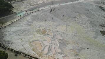 Drone flies over trail and travertines in Pamukkale, Turkey video