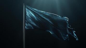 Black flag waving in the wind on a dark background photo