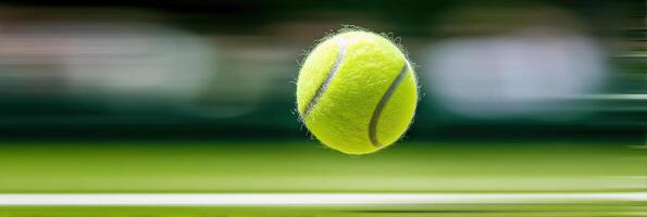 Tennis ball flying over the net during a serve with motion blur photo