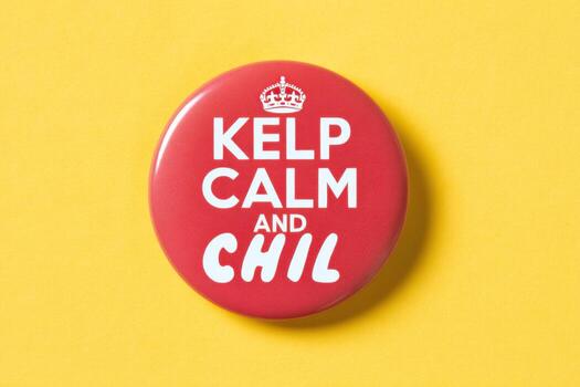 Red button inviting to kelp calm and chil on a yellow background photo