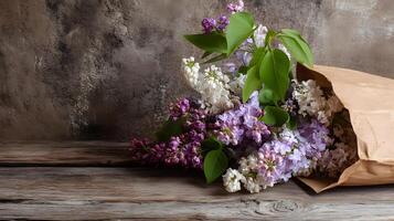Lovely lilac blooms emerging from a brown paper bag on a rustic wooden surface, offering a spacious area for your text. photo