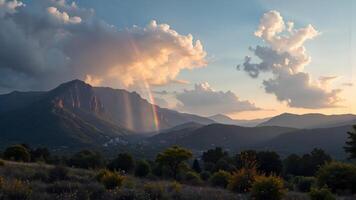 Serene Landscape with Rainbow Over Mountains Under Colorful Clouds photo