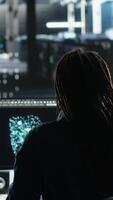 Vertical Server hub engineering team rushes to stop cyberattack targeting confidential information. Data center colleagues working together during security breach to contain virus and protect systems, camera B video