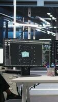 Vertical Overworked man in wheelchair upset by error warning popup while looking at server hub AI analytics metrics. Data center worker with disability irked by malfunction while using node tree tool, camera A video