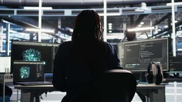 Data center system administrator using node tree software to analyze datasets. Server room IT professional using visual programming tools to improve infrastructure performance, camera A video