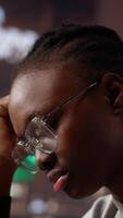 Vertical Sleepy young girl sleeping and dealing with burnout while she studies for college periodicals, working for diploma with the highest grades. Exhausted student reading before exams. Camera A. video