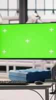 Vertical Close up of isolated screen in photovoltaics factory used to analyze performance data to optimize operations. Chroma key display in industry 4.0 solar panels plant conducting preventive maintenance video