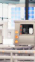 Vertical Solar panels factory engineer analyzes performance data with laptop to predict equipment failures. Photovoltaics plant worker following maintenance procedures to minimize downtime, camera B video