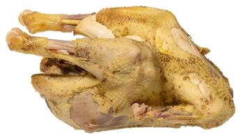 A whole boiled chicken, pale yellow in color, isolated background, ready to be served photo