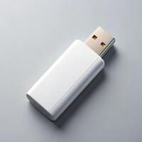 white usb drive on gray surface tech storage solution flash drive modern tech accessory on gray photo