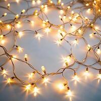 A soft glow of white fairy lights arranged on a white surface, creating a serene, dream like atmosphere, ideal for romantic or holiday decor photo