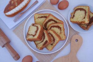 a delightful display of marble cake slices arranged neatly on a white plate photo