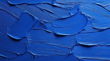 Curved Blue Oil Paint Brush Stroke Texture with flowing motion, bold texture, and dynamic surface patterns in rich color. photo