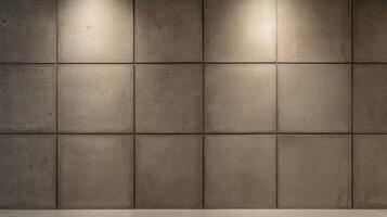 Concrete tile wall with soft lighting showcases a modern industrial style with clean lines, raw texture, and symmetrical square panel design. photo