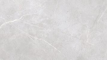 Light Gray Concrete Surface With Cracks and Veins showing natural line patterns, subtle pores, and fine texture ideal for material references or architectural backgrounds. photo