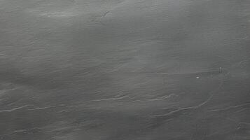 Dark Slate Stone Surface Texture Background with natural rough details and deep gray tones ideal for bold and modern design concepts. photo