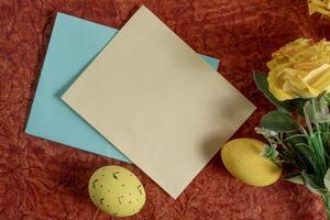 Spring themed cards, Easter eggs, and decorative decor with yellow flowers. photo
