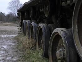 Remains of a destroyed tank from the second World War in a forest in Western Germany photo