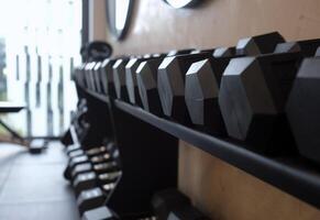 A row of weights in a gym photo