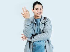Indifferent man gesturing with hand isolated. Guy with puzzled face frowning isolated photo