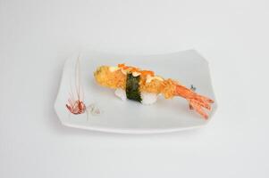 Deep fried shrimp tempura sushi with breadcrumbs photo