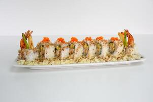 Shrimp breadcrumb filled tamago, cucumber pickle sushi roll with sauce photo