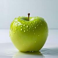 Fresh Apple with Dew Drops on Isolated White photo