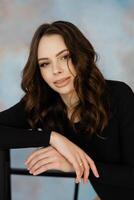 Woman Relaxing with Confident Expression photo