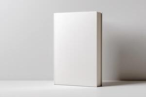 Blank book standing upright on a minimalist shelf in a modern interior space photo
