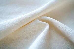 Detail of textured linen fabric in soft cream color suitable for various textile applications photo