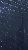 Abstract wavy surface gently moving with particles on dark background. Action video