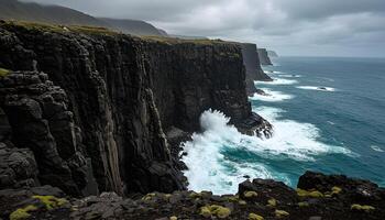 Towering cliffs with crashing waves rocky shoreline and moody overcast sky in dramatic coastal scenery photo