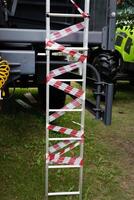 The repaired stone staircase is blocked by a large number of forbidding tapes photo