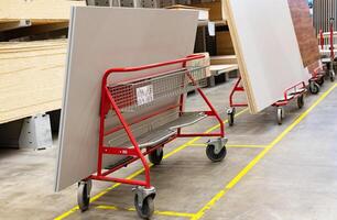 Fordable platform hand truck with cardboard box. goods sale. commerce, post box online shopping. Purchasing power, delivery order. E-commerce, sales and sale of goods through online trading platforms. photo