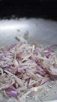 Slicing onions for a savory dish in home kitchen setup video
