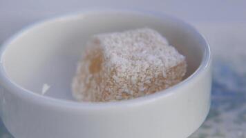 hand pick a tukish delight from a small bowl video