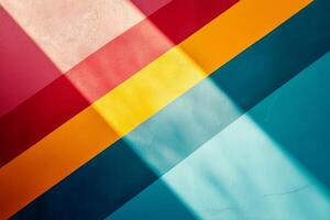 Vibrant and colorful diagonal stripes cast contrasting shadows on a textured wall adding depth photo