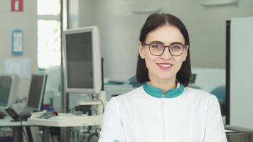 Confident female laboratory technicians beaming at the camera video