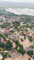 Aerial view City is flooded by a big river. A river that overflowed during the rains and flooded a large city. video