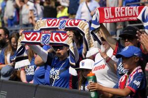 Fans react to the game between OL Reign and Portland Thorns FC during the second half at Lumen Field. - Editorial Image