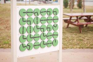 Interactive clock display in a public park encourages learning photo