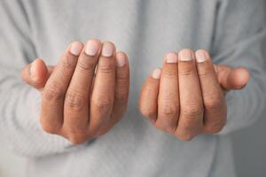 Hands held open in a gesture of offering or invitation photo
