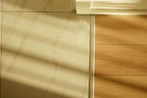 Flooring transition in natural light creates visual contrast indoors photo