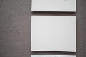 Empty display boards in an exhibition space during an art show photo